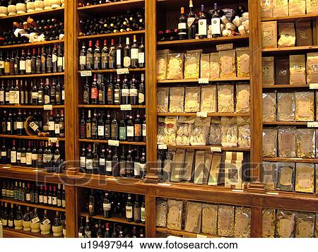 wine bottles, Tuscany, Italy, Montalcino, Toscana, Europe, Wine and pasta displayed inside a local store in the town of Montalcino. View Large Photo Image Picture - wine bottles, Tuscany, Italy, Montalcino, Toscana, Europe, Wine and pasta displayed inside a local store in the town of Montalcino.. Fotosearch
