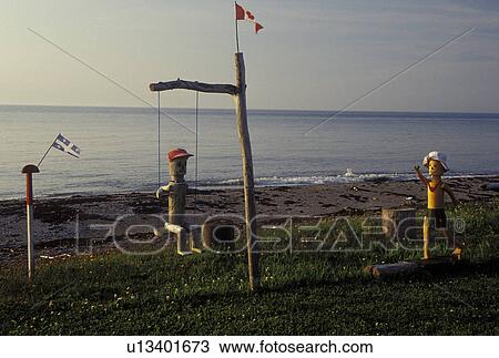 wooden sculptures, Canada, Metis-sur-Mer, Quebec, Wooden sculptures along the St. Lawrence River (Fleuve Saint-Laurent) at Metis-sur-Mer. View Large Photo Image Stock Image - wooden sculptures, Canada, Metis-sur-Mer, Quebec, Wooden sculptures along the St. Lawrence River (Fleuve Saint-Laurent) at Metis-sur-Mer.. Fotosearch