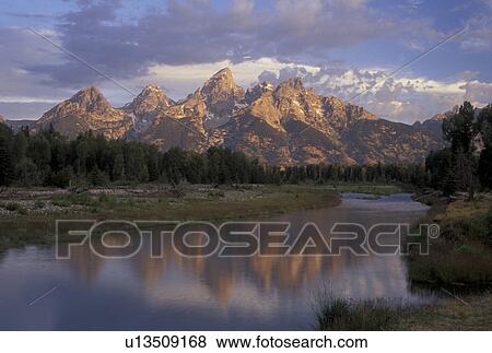 Stock Photo -  WY, Wyoming, Grand Teton National Park, Jackson Hole, Scenic view of the Grand Tetons from the Snake River in Grand Teton Nat'l Park.. Fotosearch