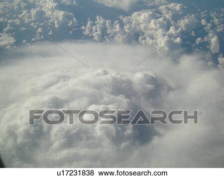 Aerial, airplane flying over the Pacific Ocean, clouds, View Large Photo Image Stock Photo - Aerial, airplane flying over the Pacific Ocean, clouds, . Fotosearch