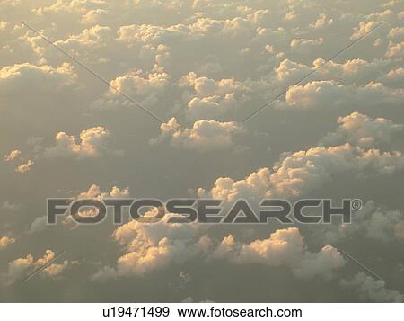 Aerial, airplane flying over the Pacific Ocean, clouds, View Large Photo Image Stock Photo - Aerial, airplane flying over the Pacific Ocean, clouds, . Fotosearch