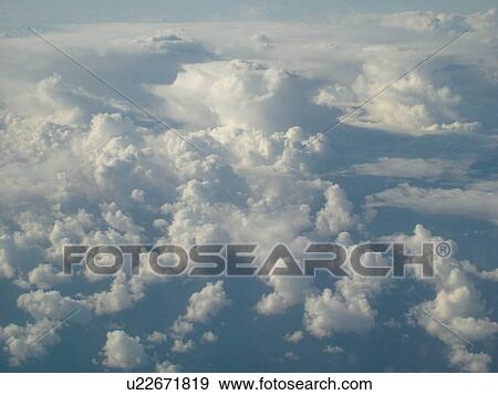 Aerial, airplane flying over the Pacific Ocean, clouds, View Large Photo Image Stock Photo - Aerial, airplane flying over the Pacific Ocean, clouds, . Fotosearch