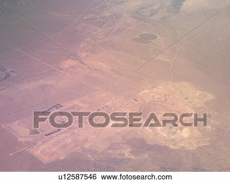 Aerial, airplane flying over the Rockies View Large Photo Image Stock Photograph - Aerial, airplane flying over the Rockies. Fotosearch