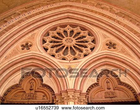 Stock Photo -  Assisi, Italy, Umbria, Europe, Fatade of the Basilica di San Francesco (Basilica of St. Francis of Assisi) and the Sacro Convento in the medieval hill town of Assisi.. Fotosearch