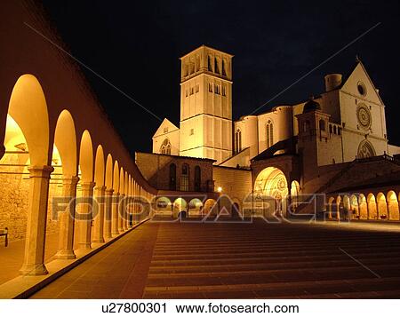 Assisi, Italy, Umbria, Europe, Basilica di San Francesco (Basilica of St. Francis of Assisi) and the Sacro Convento illuminated at night in the Piazza inf. re di San Francesco in the medieval hill town of Assisi. View Large Photo Image Stock Image - Assisi, Italy, Umbria, Europe, Basilica di San Francesco (Basilica of St. Francis of Assisi) and the Sacro Convento illuminated at night in the Piazza inf. re di San Francesco in the medieval hill town of Assisi.. Fotosearch