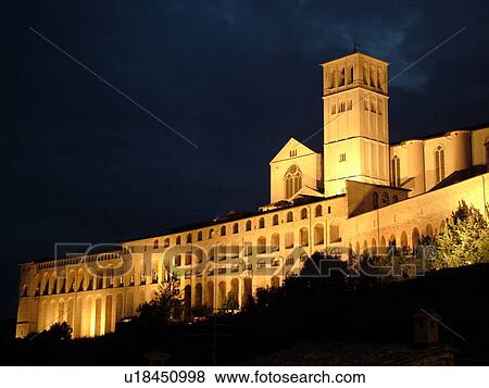 Assisi, Italy, Umbria, Europe, Basilica di San Francesco (Basilica of St. Francis of Assisi) and the Sacro Convento illuminated at night on the slopes of Monte Subasio in the medieval hill town of Assisi. View Large Photo Image Stock Photo - Assisi, Italy, Umbria, Europe, Basilica di San Francesco (Basilica of St. Francis of Assisi) and the Sacro Convento illuminated at night on the slopes of Monte Subasio in the medieval hill town of Assisi.. Fotosearch