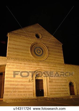 Picture -  Assisi, Umbria, Italy, Europe, Basilica di Santa Chiara illuminated at night in the medieval hill town of Assisi.. Fotosearch