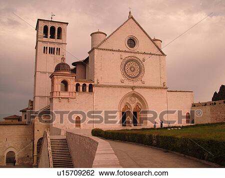 Stock Image -  Assisi, Umbria, Italy, Europe, Basilica di San Francesco (Basilica of St. Francis of Assisi) and the Sacro Convento in the medieval hill town of Assisi.. Fotosearch