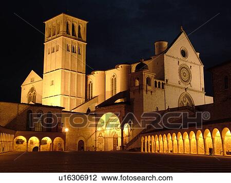 Assisi, Umbria, Italy, Europe, Basilica di San Francesco (Basilica of St. Francis of Assisi) and the Sacro Convento illuminated at night in the Piazza inf. re di San Francesco in the medieval hill town of Assisi. View Large Photo Image Stock Image - Assisi, Umbria, Italy, Europe, Basilica di San Francesco (Basilica of St. Francis of Assisi) and the Sacro Convento illuminated at night in the Piazza inf. re di San Francesco in the medieval hill town of Assisi.. Fotosearch