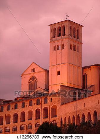 Assisi, Umbria, Italy, Europe, Basilica di San Francesco (Basilica of St. Francis of Assisi) and the Sacro Convento illuminated at night on the slopes of Monte Subasio in the medieval hill town of Assisi. View Large Photo Image Stock Photo - Assisi, Umbria, Italy, Europe, Basilica di San Francesco (Basilica of St. Francis of Assisi) and the Sacro Convento illuminated at night on the slopes of Monte Subasio in the medieval hill town of Assisi.. Fotosearch