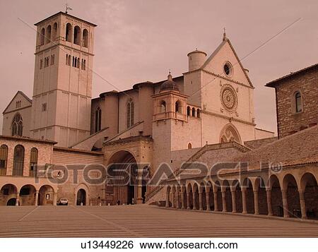 Assisi, Umbria, Italy, Europe, Basilica di San Francesco (Basilica of St. Francis of Assisi) and the Sacro Convento in the Piazza inf. re di San Francesco in the medieval hill town of Assisi. View Large Photo Image Stock Photograph - Assisi, Umbria, Italy, Europe, Basilica di San Francesco (Basilica of St. Francis of Assisi) and the Sacro Convento in the Piazza inf. re di San Francesco in the medieval hill town of Assisi.. Fotosearch