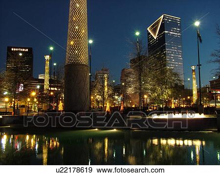 Atlanta, GA, Georgia, Centennial Park, 1996 Summer Olympics, downtown skyline, evening, Christmas decorations, fountain View Large Photo Image Stock Photo - Atlanta, GA, Georgia, Centennial Park, 1996 Summer Olympics, downtown skyline, evening, Christmas decorations, fountain. Fotosearch