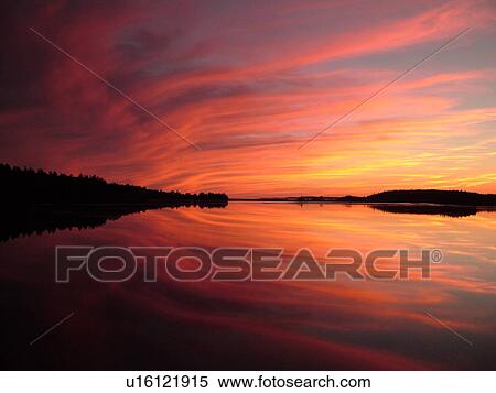 Bay of Fundy, Canada, New Brunswick, Maces Bay, Colorful reflection at sunrise on the calm waters of the Bay of Fundy at sunset. View Large Photo Image Stock Photography - Bay of Fundy, Canada, New Brunswick, Maces Bay, Colorful reflection at sunrise on the calm waters of the Bay of Fundy at sunset.. Fotosearch