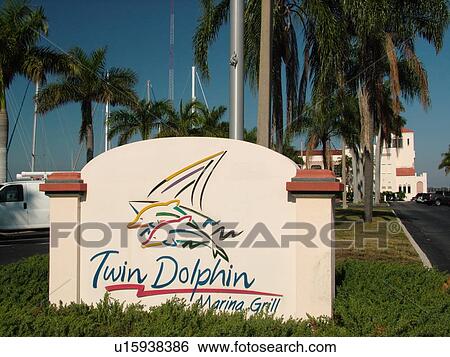 Stock Photograph -  Bradenton, FL, Florida, Manatee River, Twin Dolphin Marina, Twin Dolphin Marina Grill, sign. Fotosearch
