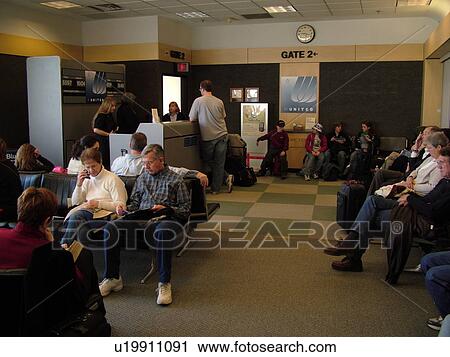 Stock Image -  Burlington, VT, Vermont, passengers waiting to board the plane at Burlington International Airport. Fotosearch