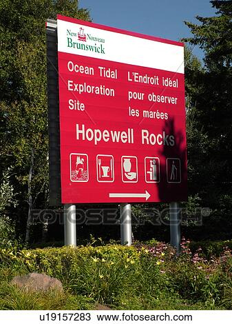 Stock Image -  Canada, New Brunswick, Bay of Fundy, Hopewell Cape, Hopewell Rocks Ocean Tidal Exploration Site entrance sign. Fotosearch