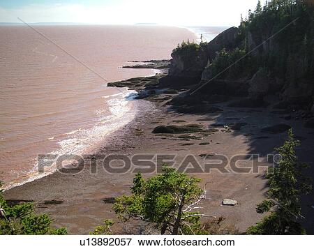 Canada, New Brunswick, Bay of Fundy, Hopewell Rocks Ocean Tidal Exploration Site, Big Cove, Hopewell Rocks, scenic coastline View Large Photo Image Stock Photo - Canada, New Brunswick, Bay of Fundy, Hopewell Rocks Ocean Tidal Exploration Site, Big Cove, Hopewell Rocks, scenic coastline. Fotosearch