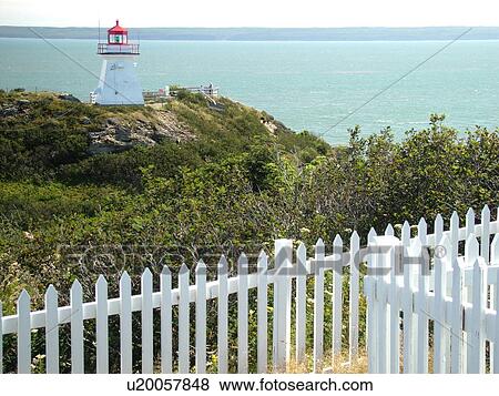 Stock Photo -  Canada, New Brunswick, Bay of Fundy, Cape Enrage, Cape Enrage Lightstation ca. 1840, lighthouse . Fotosearch