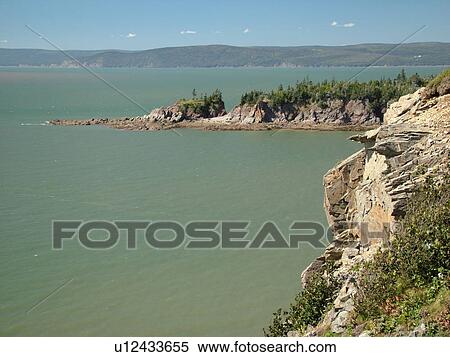 Canada, New Brunswick, Bay of Fundy, Cape Enrage, scenic coastline View Large Photo Image Stock Photography - Canada, New Brunswick, Bay of Fundy, Cape Enrage, scenic coastline. Fotosearch