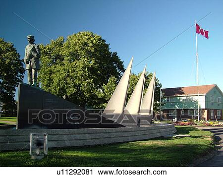 Stock Image -  Canada, New Brunswick, Moncton, Petitcodiac River, Tidal Bore, Memorial at riverfront park. Fotosearch