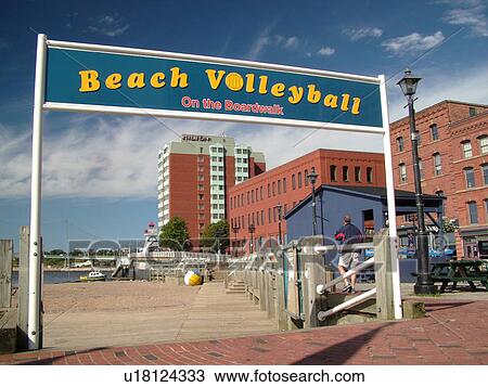 Stock Image -  Canada, New Brunswick, Saint John, Bay of Fundy, Beach volleyball courts at Loyalist Plaza on the waterfront in St. John. Fotosearch