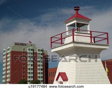 Picture -  Canada, New Brunswick, Saint John, Barbours Lighthouse and Hilton Hotel in St. John. Fotosearch