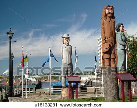 Canada, New Brunswick, Saint John, Totem pole sculptures at Loyalist Plaza in downtown St. John View Large Photo Image Stock Image - Canada, New Brunswick, Saint John, Totem pole sculptures at Loyalist Plaza in downtown St. John. Fotosearch