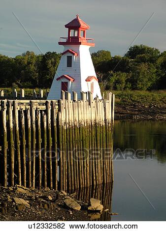 Canada, New Brunswick, St. Stephens, St. Croix River, Lighthouse along the Saint Croix River at low tide. View Large Photo Image Stock Image - Canada, New Brunswick, St. Stephens, St. Croix River, Lighthouse along the Saint Croix River at low tide.. Fotosearch