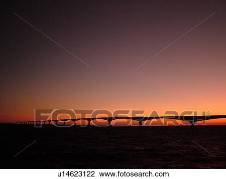 Canada, Prince Edward Island, Gulf of Saint Lawrence, PEI/NB border, Prince County, Borden-Carleton, Confederation Bridge spans the Northumberland Strait, sunset View Large Photo Image Stock Image - Canada, Prince Edward Island, Gulf of Saint Lawrence, PEI/NB border, Prince County, Borden-Carleton, Confederation Bridge spans the Northumberland Strait, sunset. Fotosearch