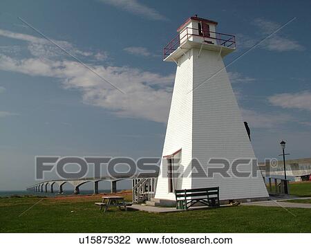 Stock Image -  Canada, Prince Edward Island, Gulf of Saint Lawrence, PEI/NB border, Prince County, Borden-Carleton, Confederation Bridge spans the Northumberland Strait, lighthouse. Fotosearch