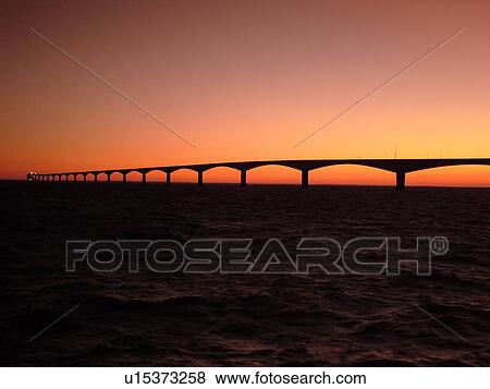 Canada, Prince Edward Island, Gulf of Saint Lawrence, PEI/NB border, Prince County, Borden-Carleton, Confederation Bridge spans the Northumberland Strait, sunset View Large Photo Image Stock Photo - Canada, Prince Edward Island, Gulf of Saint Lawrence, PEI/NB border, Prince County, Borden-Carleton, Confederation Bridge spans the Northumberland Strait, sunset. Fotosearch