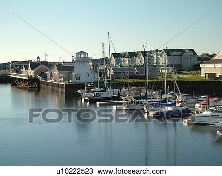 Stock Image -  Canada, Prince Edward Island, Prince County, Gulf of Saint Lawrence, Summerside, public wharf and harbor, fishing village, fishing boats, marina. Fotosearch