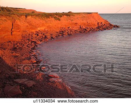 Canada, Prince Edward Island, Queens County, Gulf of Saint Lawrence, Cavendish Beach, Prince Edward Island National Park, scenic coastline, early morning light View Large Photo Image Picture - Canada, Prince Edward Island, Queens County, Gulf of Saint Lawrence, Cavendish Beach, Prince Edward Island National Park, scenic coastline, early morning light. Fotosearch