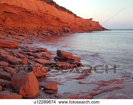 Picture -  Canada, Prince Edward Island, Queens County, Gulf of Saint Lawrence, Cavendish Beach, Prince Edward Island National Park, scenic coastline, sunrise. Fotosearch