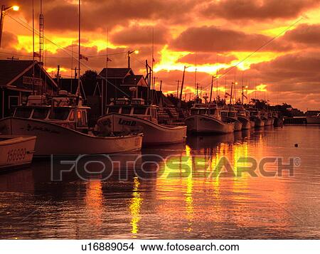 Picture -  Canada, Prince Edward Island, Queens County, Gulf of Saint Lawrence, North Rustico, sunset, fishing village, harbor, fishing boats, marina. Fotosearch