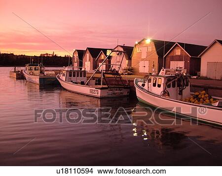 Picture -  Canada, Prince Edward Island, Queens County, Gulf of Saint Lawrence, North Rustico, fishing village, marina, fishing boats, sunset. Fotosearch