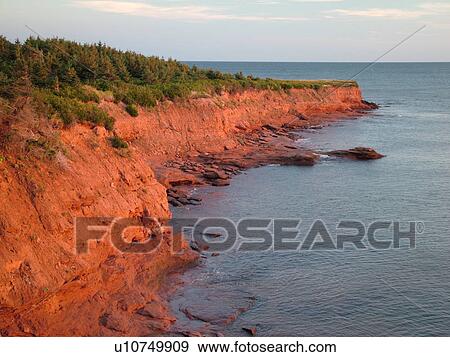 Canada, Prince Edward Island, Queens County, Gulf of Saint Lawrence, Cavendish Beach, Prince Edward Island National Park, scenic coastline, early morning light View Large Photo Image Stock Photo - Canada, Prince Edward Island, Queens County, Gulf of Saint Lawrence, Cavendish Beach, Prince Edward Island National Park, scenic coastline, early morning light. Fotosearch