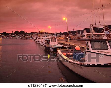 Canada, Prince Edward Island, Queens County, Gulf of Saint Lawrence, North Rustico, sunset, fishing village, harbor, fishing boats, marina View Large Photo Image Stock Photo - Canada, Prince Edward Island, Queens County, Gulf of Saint Lawrence, North Rustico, sunset, fishing village, harbor, fishing boats, marina. Fotosearch