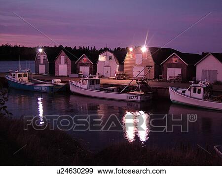 Stock Photo -  Canada, Prince Edward Island, Queens County, Gulf of Saint Lawrence, North Rustico, fishing village, marina, fishing boats, sunset. Fotosearch