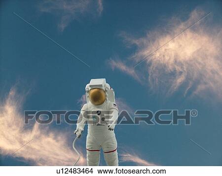Picture -  Cape Canaveral, Titusville, Merritt Island, FL, Florida, John F. Kennedy Space Center Visitor Complex, Astronaut display against a blue sky. Fotosearch