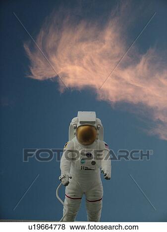 Cape Canaveral, Titusville, Merritt Island, FL, Florida, John F. Kennedy Space Center Visitor Complex, Astronaut display against a blue sky with pink clouds View Large Photo Image Stock Photo - Cape Canaveral, Titusville, Merritt Island, FL, Florida, John F. Kennedy Space Center Visitor Complex, Astronaut display against a blue sky with pink clouds. Fotosearch