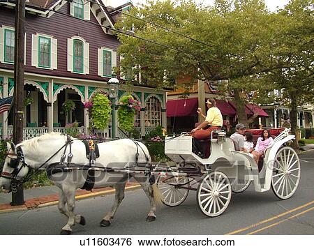 Cape May, NJ, New Jersey, Historic District, carriage ride View Large Photo Image Stock Photograph - Cape May, NJ, New Jersey, Historic District, carriage ride. Fotosearch