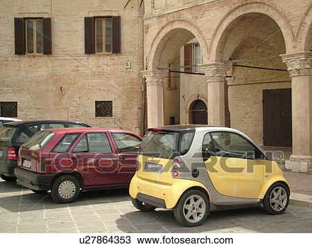 cars, Umbria, Italy, Montefalco, Europe, Smart car by Mercedes and Swatch parked in the Piazza in downtown Montefalco. View Large Photo Image Stock Image - cars, Umbria, Italy, Montefalco, Europe, Smart car by Mercedes and Swatch parked in the Piazza in downtown Montefalco.. Fotosearch