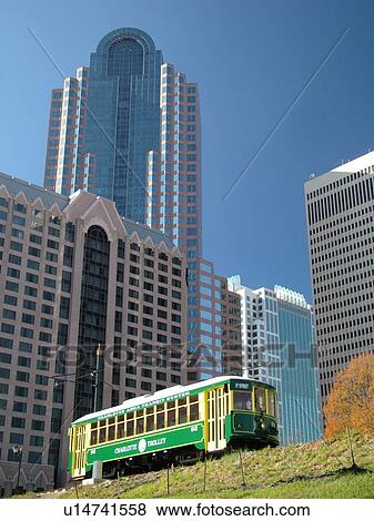 Stock Photo -  Charlotte, NC, North Carolina, downtown, Charlotte Trolley, Center City Circuit electric shuttle bus, Uptown. Fotosearch