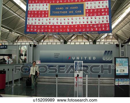 Chicago, Il, Illinois, O'Hare International airport, hub, interior, concourse, United Customer Service Counter View Large Photo Image Stock Photo - Chicago, Il, Illinois, O'Hare International airport, hub, interior, concourse, United Customer Service Counter. Fotosearch