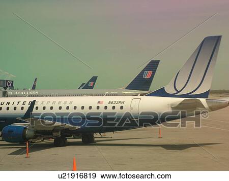 Chicago, Il, Illinois, O'Hare International airport, hub, United Airlines Planes parked at gate View Large Photo Image Stock Photo - Chicago, Il, Illinois, O'Hare International airport, hub, United Airlines Planes parked at gate. Fotosearch