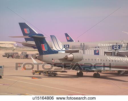 Stock Photograph -  Chicago, Il, Illinois, O'Hare International airport, hub, United Airlines Planes parked at gate. Fotosearch