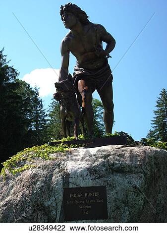 Stock Image -  Cooperstown, NY, New York, Indian Hunter Statue on the lakefront of Otsego Lake.. Fotosearch