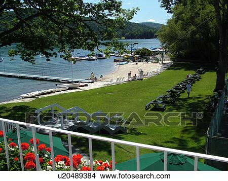 Cooperstown, NY, New York, Otsego Lake, The Ostesaga Resort Hotel, Country Club, beach front, lakefront View Large Photo Image Picture - Cooperstown, NY, New York, Otsego Lake, The Ostesaga Resort Hotel, Country Club, beach front, lakefront. Fotosearch