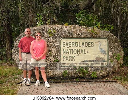 Everglades National Park, FL, Florida, Entrance, couple posing for picture View Large Photo Image Picture - Everglades National Park, FL, Florida, Entrance, couple posing for picture. Fotosearch